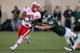 EAST LANSING, MI - NOVEMBER 03: Ameer Abdullah #8 of the Nebraska Cornhuskers tries to get around the tackle of Max Bullough #40 of the Michigan State Spartans during a fourth quarter run at Spartan Stadium Stadium on November 3, 2012 in East Lansing, Michigan. (Photo by Gregory Shamus/Getty Images)