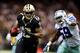 NEW ORLEANS, LA - NOVEMBER 10: Wide receiver Robert Meachem #17 of the New Orleans Saints runs with the ball as inside linebacker Ernie Sims #59 of the Dallas Cowboys defends during a game at the Mercedes-Benz Superdome on November 10, 2013 in New Orleans, Louisiana. (Photo by Ronald Martinez/Getty Images)