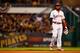 PITTSBURGH, PA - OCTOBER 01: Brandon Phillips #4 of the Cincinnati Reds reacts to an error in the fourth inning against the Pittsburgh Pirates during the National League Wild Card game at PNC Park on October 1, 2013 in Pittsburgh, Pennsylvania. (Photo by Justin K. Aller/Getty Images)