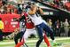 Nov 10, 2013; Atlanta, GA, USA; Seattle Seahawks wide receiver Jermaine Kearse (15) catches a touchdown with coverage by Atlanta Falcons safety Thomas DeCoud (28) in the first half at the Georgia Dome. Mandatory Credit: Daniel Shirey-USA TODAY Sports