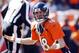 Oct 13, 2013; Denver, CO, USA; Denver Broncos quarterback Peyton Manning (18) reacts during the first half against the Jacksonville Jaguars at Sports Authority Field at Mile High. Mandatory Credit: Chris Humphreys-USA TODAY Sports