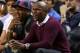 MIAMI, FL - NOVEMBER 12: Championship boxer Floyd Mayweather Jr watches a game between the Miami Heat and the Milwaukee Bucks at AmericanAirlines Arena on November 12, 2013 in Miami, Florida. NOTE TO USER: User expressly acknowledges and agrees that, by downloading and/or using this photograph, user is consenting to the terms and conditions of the Getty Images License Agreement. Mandatory copyright notice: (Photo by Mike Ehrmann/Getty Images)