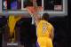 Nov 12, 2013; Los Angeles, CA, USA; Los Angeles Lakers forward Xavier Henry (7) dunks the ball against New Orleans Pelicans center Jeff Withey (5) at Staples Center. The Lakers defeated the Pelicans 116-95. Mandatory Credit: Kirby Lee-USA TODAY Sports