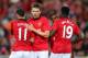 SYDNEY, AUSTRALIA - JULY 20: Danny Welbeck of Manchester United celebrates with team mates Michael Carrick and Ryan Giggs after scoring a goal during the match between the A-League All-Stars and Manchester United at ANZ Stadium on July 20, 2013 in Sydney, Australia. (Photo by Brendon Thorne/Getty Images)