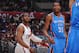 LOS ANGELES, CA - MARCH 3: Chris Paul #3 of the Los Angeles Clippers and Kevin Durant #35 of the Oklahoma City Thunder look on at Staples Center on March 3, 2013 in Los Angeles, California. NOTE TO USER: User expressly acknowledges and agrees that, by downloading and/or using this Photograph, user is consenting to the terms and conditions of the Getty Images License Agreement. Mandatory Copyright Notice: Copyright 2013 NBAE (Photo by Noah Graham/NBAE via Getty Images)