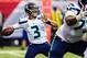 Nov 10, 2013; Atlanta, GA, USA; Seattle Seahawks quarterback Russell Wilson (3) throws a pass in the first quarter against the Atlanta Falcons at the Georgia Dome. Mandatory Credit: Daniel Shirey-USA TODAY Sports