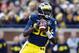 Nov 9, 2013; Ann Arbor, MI, USA; Michigan Wolverines quarterback Devin Gardner (98) passes the ball in the first quarter against the Nebraska Cornhuskers at Michigan Stadium. Mandatory Credit: Rick Osentoski-USA TODAY Sports