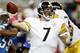 DETROIT , MI - OCTOBER 11: Ben Roethlisberger #7 of the Pittsburgh Steelers throws a first quarter pass while playing the Detroit Lions on October 11, 2009 at Ford Field in Detroit, Michigan. (Photo by Gregory Shamus/Getty Images)