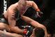 Mar 16, 2013; Montreal, Quebec, CAN; Georges St.Pierre (red) throws punches at Nick Diaz (blue) during their Welterweight title bout at UFC 158 at the Bell Centre. Mandatory Credit: Eric Bolte-USA TODAY Sports
