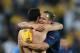 DONETSK, UKRAINE - JUNE 15: A laser is directed at the head of Philippe Mexes (R) of France as he celebrates victory with team-mate Adil Rami after the UEFA EURO 2012 group D match between Ukraine and France at Donbass Arena on June 15, 2012 in Donetsk, Ukraine. (Photo by Ian Walton/Getty Images)