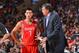 PHILADELPHIA, PA - NOVEMBER 13: Kevin McHale, Head Coach of the Houston Rockets shares a word with Jeremy Lin #7 during the game against the Philadelphia 76ers at the Wells Fargo Center on November 13, 2013 in Philadelphia, Pennsylvania. NOTE TO USER: User expressly acknowledges and agrees that, by downloading and or using this photograph, User is consenting to the terms and conditions of the Getty Images License Agreement. Mandatory Copyright Notice: Copyright 2013 NBAE (Photo by Jesse D. Garrabrant/NBAE via Getty Images)