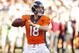 Oct 27, 2013; Denver, CO, USA; Denver Broncos quarterback Peyton Manning (18) throws the ball during the second half against the Washington Redskins at Sports Authority Field at Mile High. The Broncos won 45-21. Mandatory Credit: Chris Humphreys-USA TODAY Sports