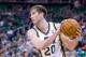 Nov 13, 2013; Salt Lake City, UT, USA; Utah Jazz shooting guard Gordon Hayward (20) controls the ball during the first half against the New Orleans Pelicans at EnergySolutions Arena. Mandatory Credit: Russ Isabella-USA TODAY Sports