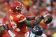 Oct 20, 2013; Kansas City, MO, USA; Houston Texans cornerback Brice McCain (21) breaks up a pass intended for Kansas City Chiefs wide receiver Dwayne Bowe (82) during the second half at Arrowhead Stadium. The Chiefs won 17-16. Mandatory Credit: Denny Medley-USA TODAY Sports