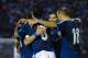 MONTEVIDEO, URUGUAY - OCTOBER 15: Maximiliano Rodriguez (#11), Sergio Aguero (#10), Augusto Fernandez (#8) and Rodrigo Palacio of Argentina celebrate a scored goal during a match between Uruguay and Argentina as part of the 18th round of the South American Qualifiers for the FIFA World Cup Brazil 2014 at Centenario Stadium Stadium on October 15, 2013 in Montevideo, Uruguay. (Photo by Buda Mendes/Getty Images)