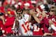 KANSAS CITY, MO - OCTOBER 27: A Kansas City Chiefs fan celebrates the Kansas City Chiefs scoring during the game against the Cleveland Browns at Arrowhead Stadium on October 27, 2013 in Kansas City, Missouri. (Photo by David Welker/Getty Images)