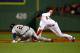 BOSTON, MA - OCTOBER 12: Jhonny Peralta #27 of the Detroit Tigers is tagged out by Stephen Drew #7 of the Boston Red Sox on a fielder's choice in the fourth inning during Game One of the American League Championship Series at Fenway Park on October 12, 2013 in Boston, Massachusetts. (Photo by Al Bello/Getty Images)