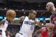 Dallas Mavericks guard Monta Ellis drives against Washington Wiazrds center Marcin Gortat