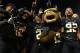 Nov 7, 2013; Waco, TX, USA; Baylor Bear mascot Bruiser celebrates with the team after the game against the Oklahoma Sooners at Floyd Casey Stadium.Baylor beat Oklahoma 41-12. Mandatory Credit: Tim Heitman-USA TODAY Sports