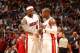 MIAMI, FL - NOVEMBER 3: LeBron James #6 of the Miami Heat shares a word with teammate Dwyane Wade #3 during the game against the Washington Wizards on November 3, 2013 at American Airlines Arena in Miami, Florida. NOTE TO USER: User expressly acknowledges and agrees that, by downloading and/or using this photograph, user is consenting to the terms and conditions of the Getty Images License Agreement. Mandatory copyright notice: Copyright NBAE 2013 (Photo by Issac Baldizon/NBAE via Getty Images)