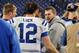 NASHVILLE, TN - NOVEMBER 14: Quarterback Andrew Luck #12 of the Indianapolis Colts speaks to injured quarterback Jake Locker of the Tennessee Titans after a 30-27 Colts victory at LP Field on November 14, 2013 in Nashville, Tennessee. (Photo by Frederick Breedon/Getty Images)