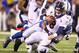 INDIANAPOLIS, IN - OCTOBER 20: Peyton Manning #18 of the Denver Broncos is sacked by Fili Moala #95 of the Indianapolis Colts at Lucas Oil Stadium on October 20, 2013 in Indianapolis, Indiana. The Colts beat the Broncos 39-33. (Photo by Dilip Vishwanat/Getty Images)