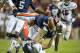 AUBURN, AL - OCTOBER 26: Defensive back D'Joun Smith #21 of the Florida Atlantic Owls flips quarterback Nick Marshall #14 of the Auburn Tigers during the first quarter of play on October 26, 2013 at Jordan-Hare Stadium in Auburn, Alabama. At the end of the first quarter Auburn leads Florida Atlantic 21-0. (Photo by Michael Chang/Getty Images)