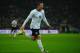 LONDON, ENGLAND - OCTOBER 15: Wayne Rooney of England celebrates after scoring his team's opening goal during the FIFA 2014 World Cup Qualifying Group H match between England and Poland at Wembley Stadium on October 15, 2013 in London, England. (Photo by Laurence Griffiths/Getty Images)