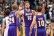 Mar 27, 2013; Minneapolis, MN, USA; Los Angeles Lakers power forward Pau Gasol (16) congratulates teammates Kobe Bryant (24) and Steve Nash (10) at the end of the fourth quarter at Target Center. Lakers won 120-117. Mandatory Credit: Greg Smith-USA TODAY Sports