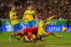 LISBON, PORTUGAL - NOVEMBER 15: Cristiano Ronaldo of Portugal dives to head the only goal ahead of Martin Olsson of Sweden during the FIFA 2014 World Cup Qualifier Play-off First Leg between Portugal and Sweden at Estadio da Luz on November 15, 2013 in Lisbon, Portugal. (Photo by Mike Hewitt/Getty Images)