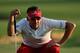 DUBAI, UNITED ARAB EMIRATES - NOVEMBER 16: Ian Poulter of England lines up a putt on the 18th hole during the third round of the DP World Tour Championship, Dubai on the Earth Course at Jumeirah Golf Estates on November 16, 2013 in Dubai, United Arab Emirates. (Photo by Andrew Redington/Getty Images)