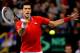 BELGRADE, SERBIA - NOVEMBER 15: Novak Djokovic of Serbia plays a forehand against Radek Stepanek of Czech Republic during the day one of the final Davis Cup match between Serbia and Czech Republic at Kombank Arena on November 15, 2013 in Belgrade, Serbia. (Photo by Srdjan Stevanovic/Getty Images)