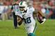 TAMPA, FL - NOVEMBER 11: Wide receiver Rishard Matthews #18 of the Miami Dolphins runs for a touchdown against the Tampa Bay Buccaneers November 11, 2013 at Raymond James Stadium in Tampa, Florida. Tampa won 22 - 19. (Photo by Al Messerschmidt/Getty Images)