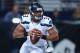 ST LOUIS, MO - OCTOBER 28: 8: Russell Wilson #3 of the Seattle Seahawks looks to pass against the St. Louis Rams during an NFL game at Edward Jones Dome on October 28, 2013 in St Louis, Missouri. (Photo by Andy Lyons/Getty Images)