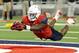 Sep 14, 2013; Tucson, AZ, USA; Arizona Wildcats running back KaDeem Carey (25) scores a touchdown that was later called back because of an illegal formation during the fourth quarter against the Texas-San Antonio Roadrunners at Arizona Stadium. The Wildcats defeated the Roadrunners 38-13. Mandatory Credit: Casey Sapio-USA TODAY Sports
