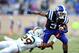 DURHAM, NC - NOVEMBER 16: Corn Elder #29 of the Miami Hurricanes makes a diving tackle to stop Jamison Crowder #3 of the Duke Blue Devils during play at Wallace Wade Stadium on November 16, 2013 in Durham, North Carolina. (Photo by Grant Halverson/Getty Images)