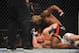 Nov 16, 2013; Las Vegas, NV, USA; Rashad Evans (red gloves) fights against Chael Sonnen (blue gloves) in their light heavyweight bout during UFC 167 at MGM Grand Garden Arena. Mandatory Credit: Stephen R. Sylvanie-USA TODAY Sports