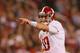STARKVILLE, MS - NOVEMBER 16: AJ McCarron #10 of the Alabama Crimson Tide points out the defense against the Mississippi State Bulldogs at Davis Wade Stadium on November 16, 2013 in Starkville, Mississippi. (Photo by Kevin C. Cox/Getty Images)