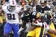 PITTSBURGH, PA - NOVEMBER 10: Le'Veon Bell #26 of the Pittsburgh Steelers rushes against Manny Lawson #91 of the Buffalo Bills during the game on November 10, 2013 at Heinz Field in Pittsburgh, Pennsylvania. (Photo by Justin K. Aller/Getty Images)