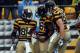 Nov 17, 2013; Pittsburgh, PA, USA; Pittsburgh Steelers wide receiver Antonio Brown (84) is congratulated by teammates after scoring a touchdown against the Detroit Lions during the first quarter at Heinz Field. Mandatory Credit: Jason Bridge-USA TODAY Sports