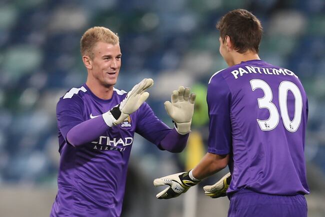 Hi-res-173969765-joe-hart-goalkeeper-of-manchester-city-off-costel_crop_north