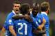 MILAN, ITALY - OCTOBER 16: Mario Balotelli (R) of Italy celebrates his goal with team-mates Andrea Pirlo during the FIFA 2014 World Cup qualifier match between Italy and Denmark at Stadio Giuseppe Meazza on October 16, 2012 in Milan, Italy. (Photo by Marco Luzzani/Getty Images)