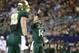 Nov 16, 2013; Arlington, TX, USA; Baylor Bears quarterback Bryce Petty (14) points to the sky after a touchdown was scored in the fourth quarter of the game against the Texas Tech Red Raiders at AT&T Stadium. Baylor beat Texas Tech 63-34. Mandatory Credit: Tim Heitman-USA TODAY Sports