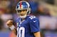 Eli Manning's solid effort helps lead the Giants to their fourth consecutive win.