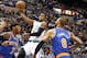 Oct 13, 2012; Hartford, CT, USA; Boston Celtics guard Rajon Rondo (9) shoots the ball against New York Knicks forward Carmelo Anthony (7) and center Tyson Chandler (6) during the first half at XL Center. Mandatory Credit: Mark L. Baer-USA TODAY Sports