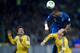 KIEV, UKRAINE - NOVEMBER 15: Patrice Evra (C) of France fights for the ball with Ukraine's Edmar Halovskyi (L) and Ukraine's Roman Zozulya (R) during the FIFA 2014 World Cup Qualifier Play-off First Leg soccer match between Ukraine and France at the Olympic Stadium on November 15, 2013 in Kiev, Ukraine. (Photo by Adam Nurkiewicz/Getty Images)
