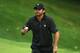 DUBLIN, OH - OCTOBER 06: Jason Day of Australia and the International Team waves to the gallery on the fourth green during the Day Four Singles Matches at the Muirfield Village Golf Club on October 6, 2013 in Dublin, Ohio. (Photo by Andy Lyons/Getty Images)