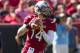 Nov 2, 2013; Columbia, SC, USA; South Carolina Gamecocks quarterback Connor Shaw (14) drops back to pass during the first quarter against the Mississippi State Bulldogs at Williams-Brice Stadium. Mandatory Credit: Jeremy Brevard-USA TODAY Sports