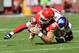 KANSAS CITY, MO - SEPTEMBER 29: Defensive back Aaron Ross #31 of the New York Giants tackles tight end Sean McGrath #84 of the Kansas City Chiefs during the first half on September 29, 2013 at Arrowhead Stadium in Kansas City, Missouri. Kansas City defeated New York 31-7. (Photo by Peter Aiken/Getty Images)