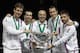 BELGRADE, SERBIA - NOVEMBER 17: (L-R) Tomas Berdych, Radek Stepanek team captain Vladimir Safarik, Lukas Rosol and Jan Hayek of Czech Republic hold the winners trophy aloft after a 3-2 victory against Serbia during day three of the Davis Cup World Group Final between Serbia and Czech Republic at Kombank Arena on November 17, 2013 in Belgrade, Serbia. (Photo by Srdjan Stevanovic/Getty Images)
